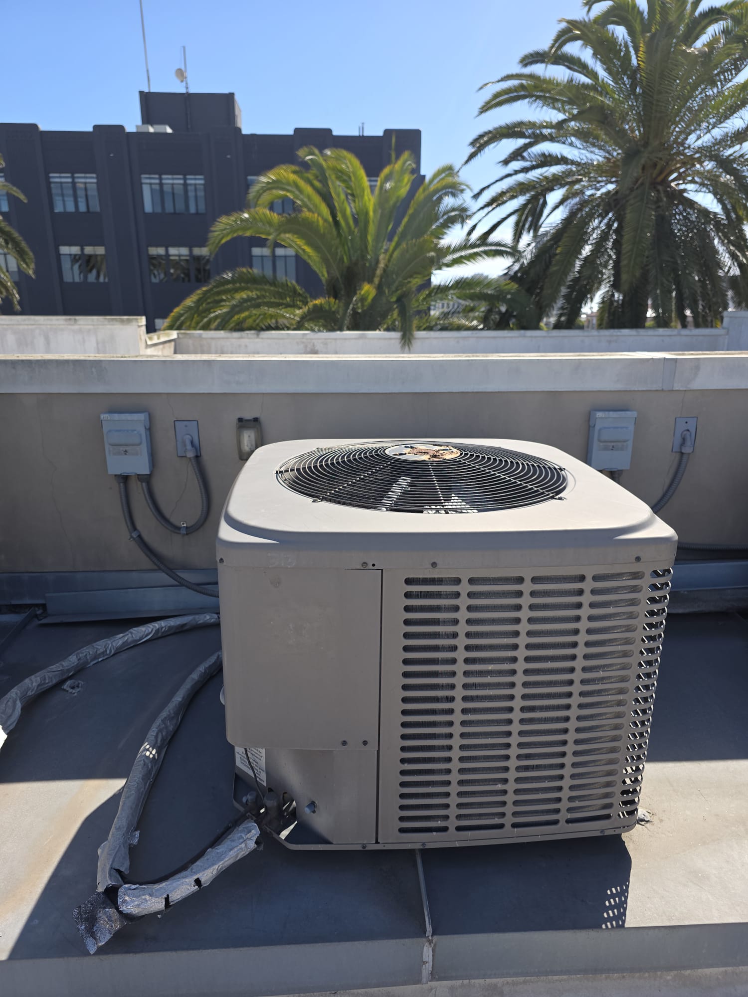 Finished rooftop air conditioning condenser installation in Pasadena